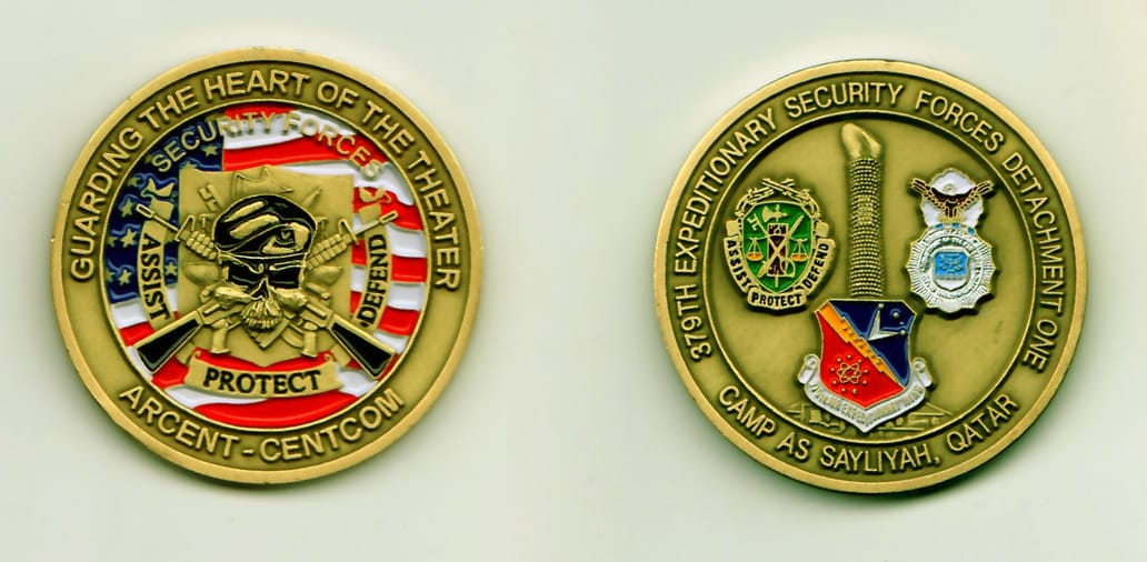 Round shaped, brass colored coin, 1-3/4 inches in diameter.