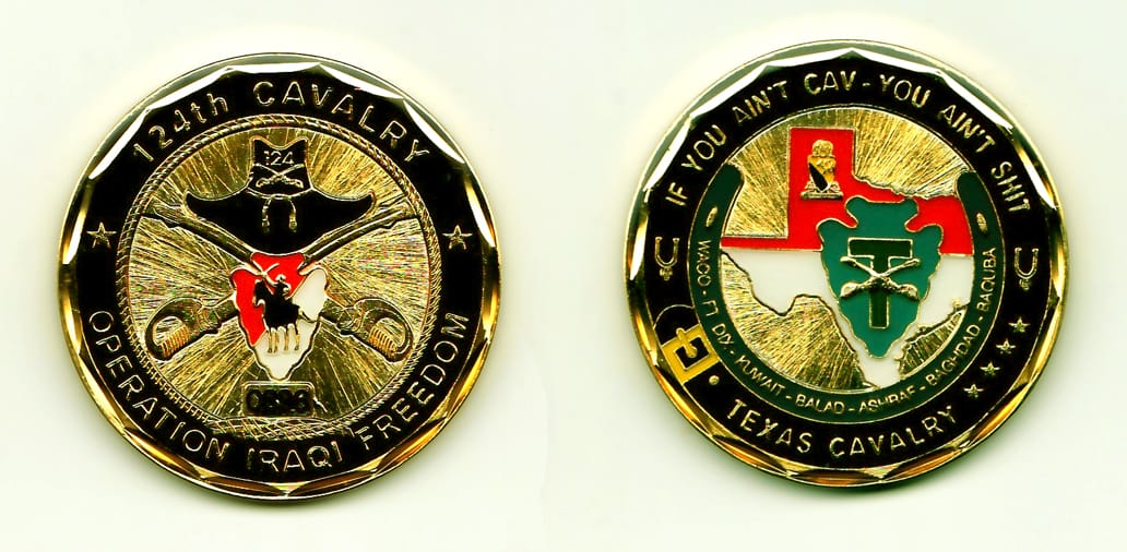 Round shaped, gold colored coin, 2 inches in diameter.