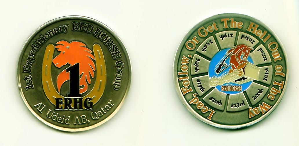 Round shaped, pewter colored coin, 2 inches in diameter.