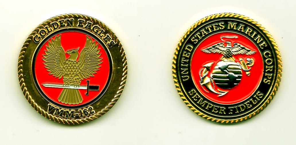 Round shaped, gold colored coin, 1-3/4 inches in diameter.