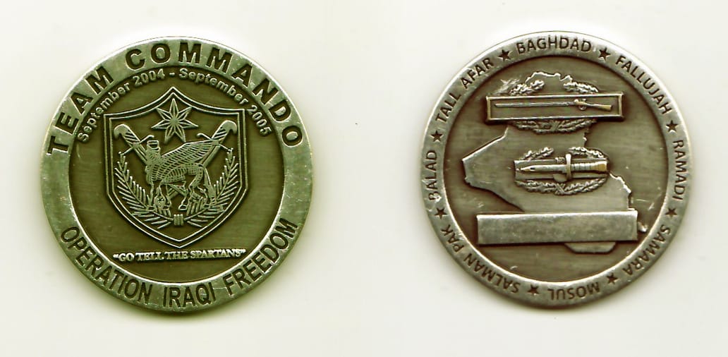 Round shaped, silver colored coin, 1-7/8 inches in diameter.