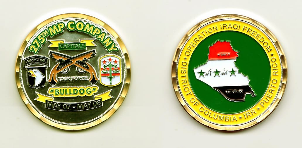 Round shaped, silver colored coin, with brass colored rim, 1-7/8 inches in diameter.