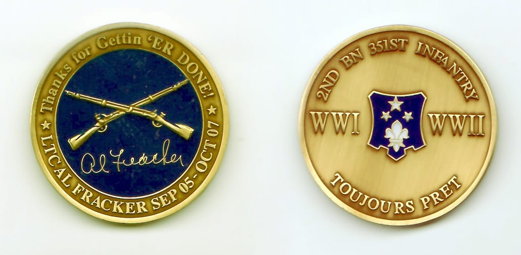 Round shaped, gold colored coin, 1-7/16 inches in diameter.