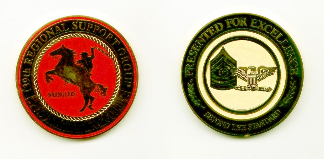 Round shaped, gold colored coin, 1-1/2 inches in diameter.