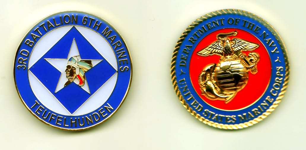 Round shaped, gold colored coin, 1-1/2 inches in diameter.