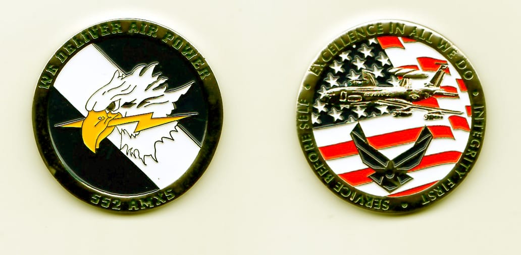 Round shaped, silver colored coin, 1-5/8 inches in diameter.