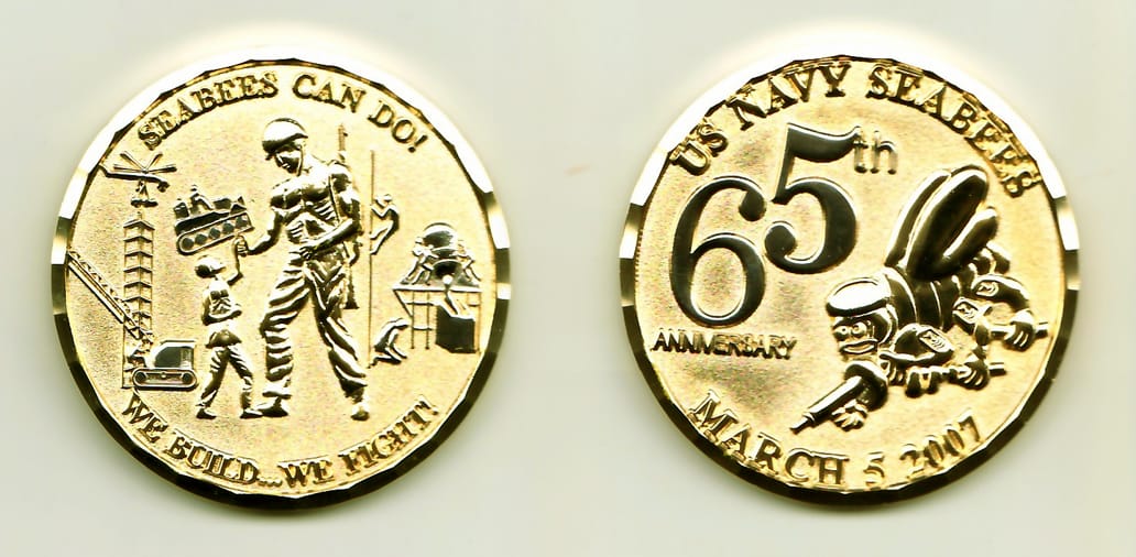 Round shaped, silver colored coin, 2 inches in diameter.