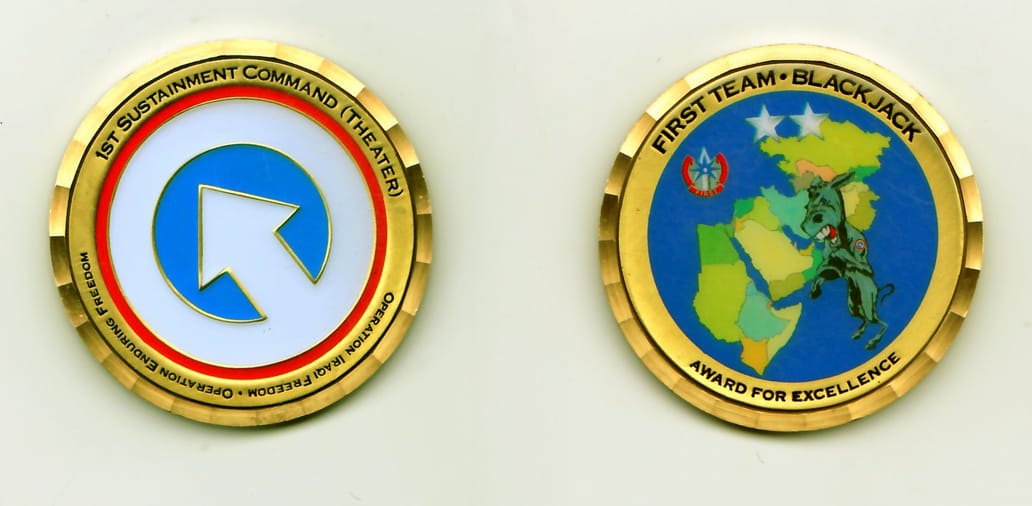 Round shaped, gold colored coin, 1-7/8 inches in diameter.