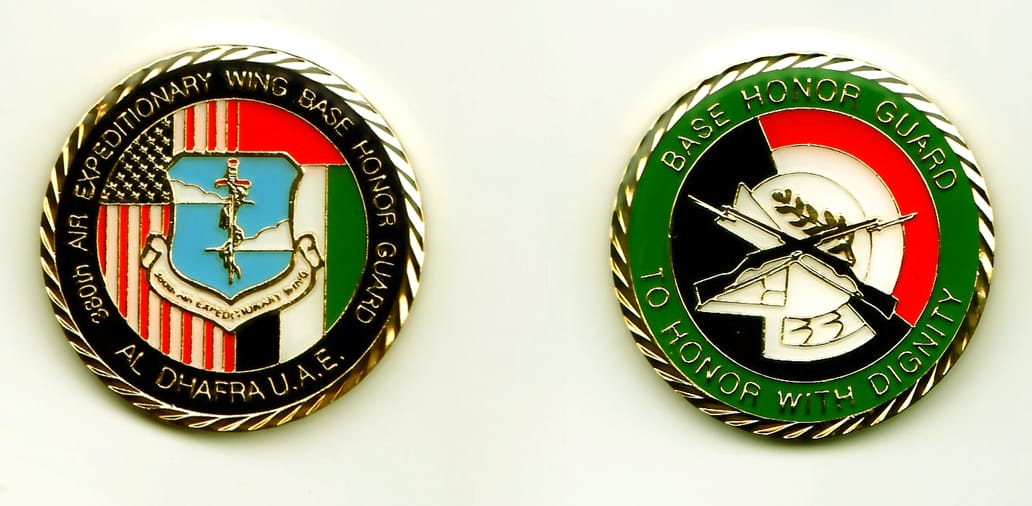 Round shaped, gold colored coin, 1-1/2 inches in diameter.