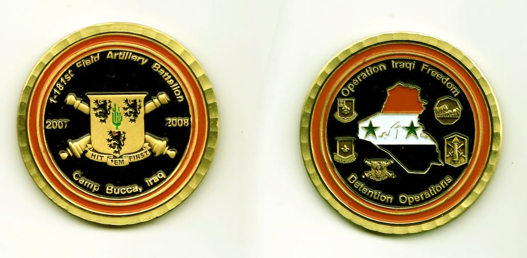 Round shaped, gold colored coin, 1-15/16 inches in diameter.