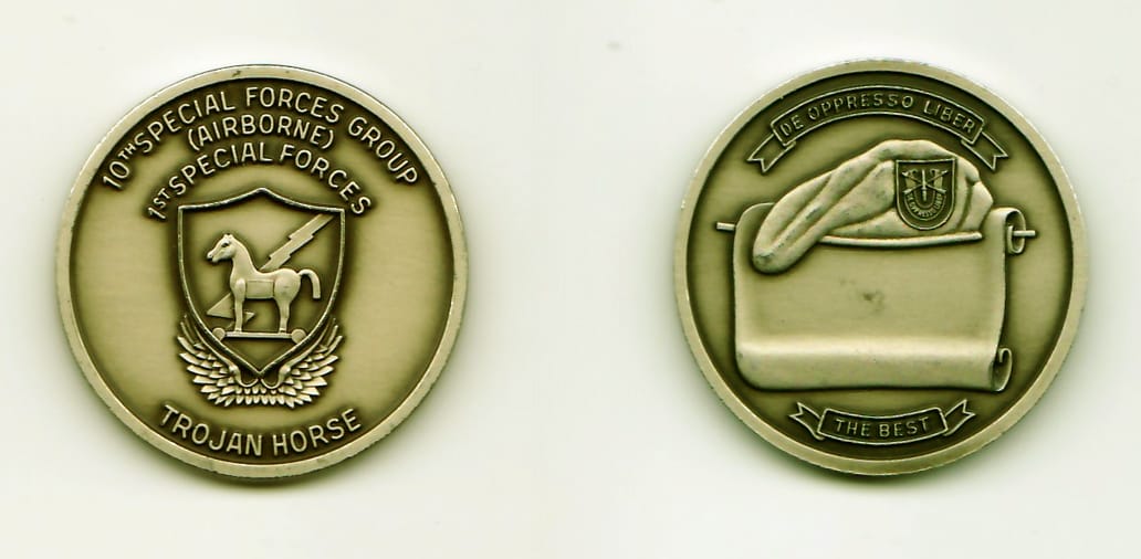 Round shaped, pewter colored coin, 1-5/16 inches in diameter.