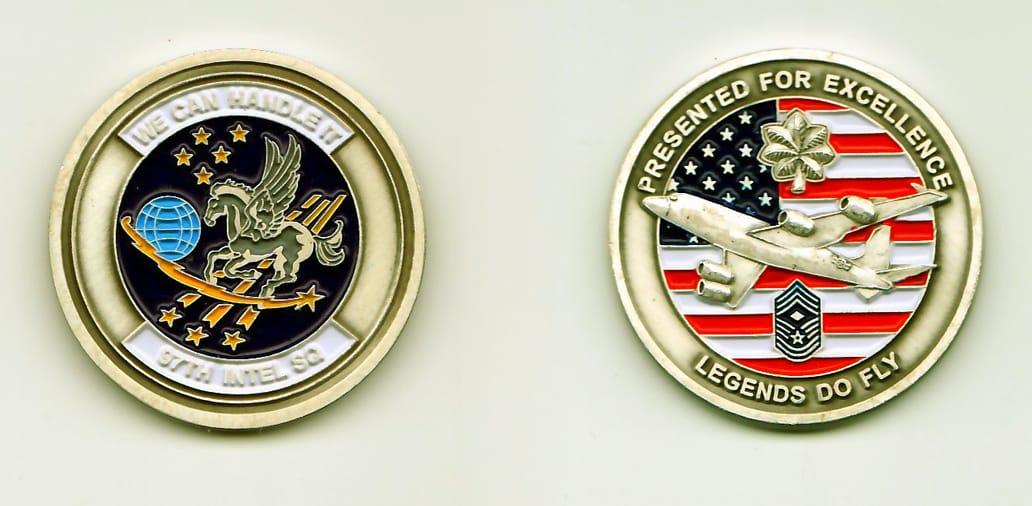 Round shaped, pewter colored coin, 1-1/2 inches in diameter.