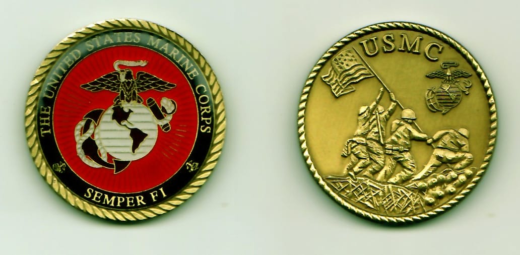 Round shaped, gold colored coin, 1-1/4 inches in diameter.