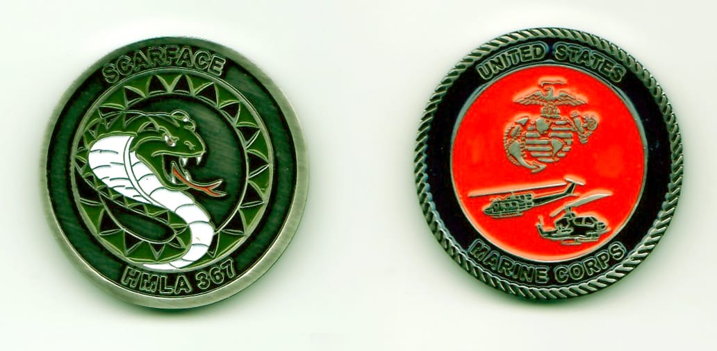 Round shaped, pewter colored coin, 1-1/2 inches in diameter.