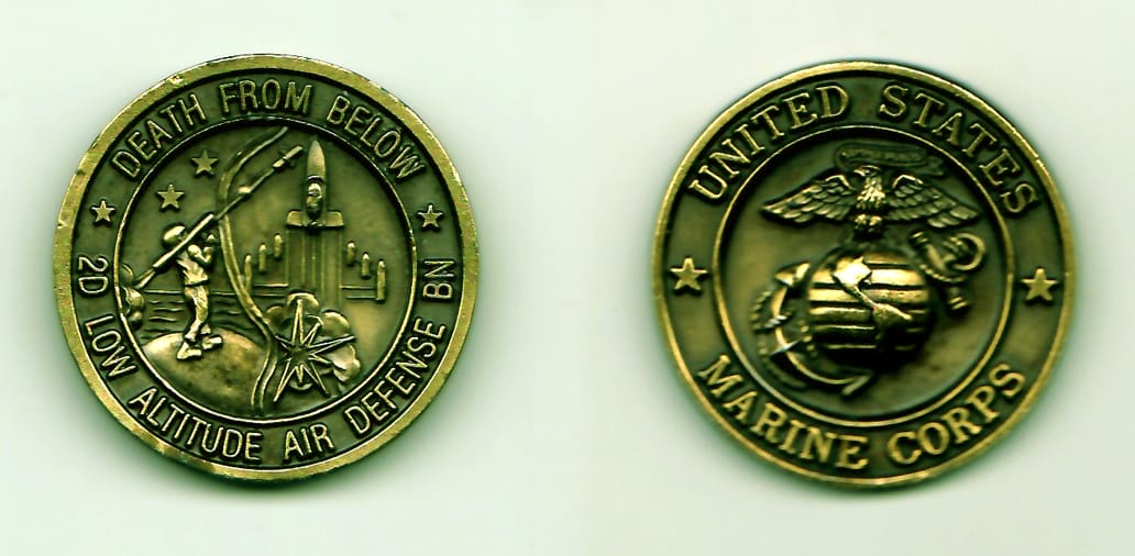 Round shaped, antique brass colored coin, 1-9/16 inches in diameter.