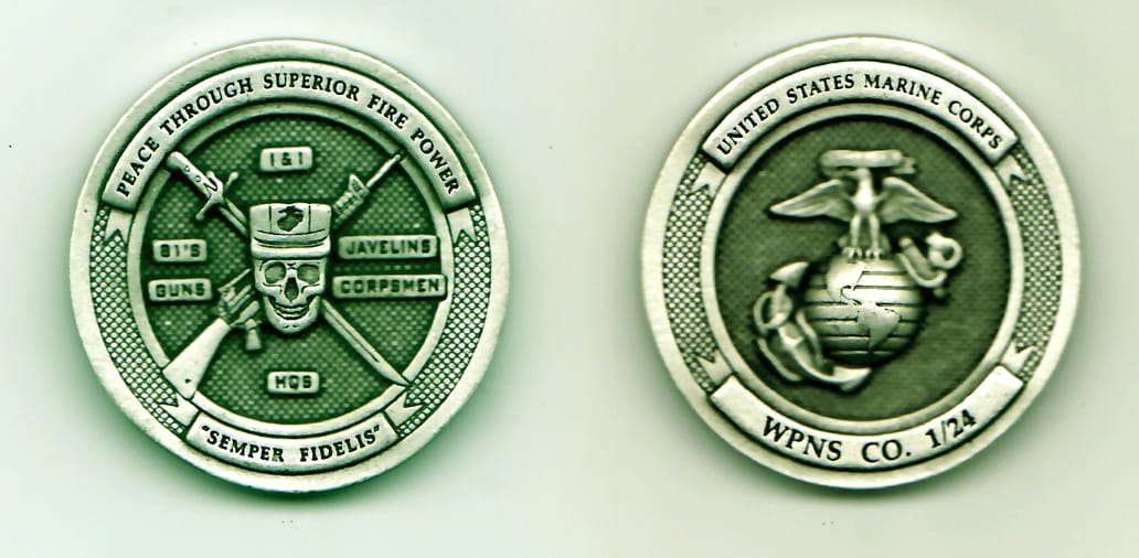 Round shaped, silver colored coin, 1-5/8 inches in diameter.