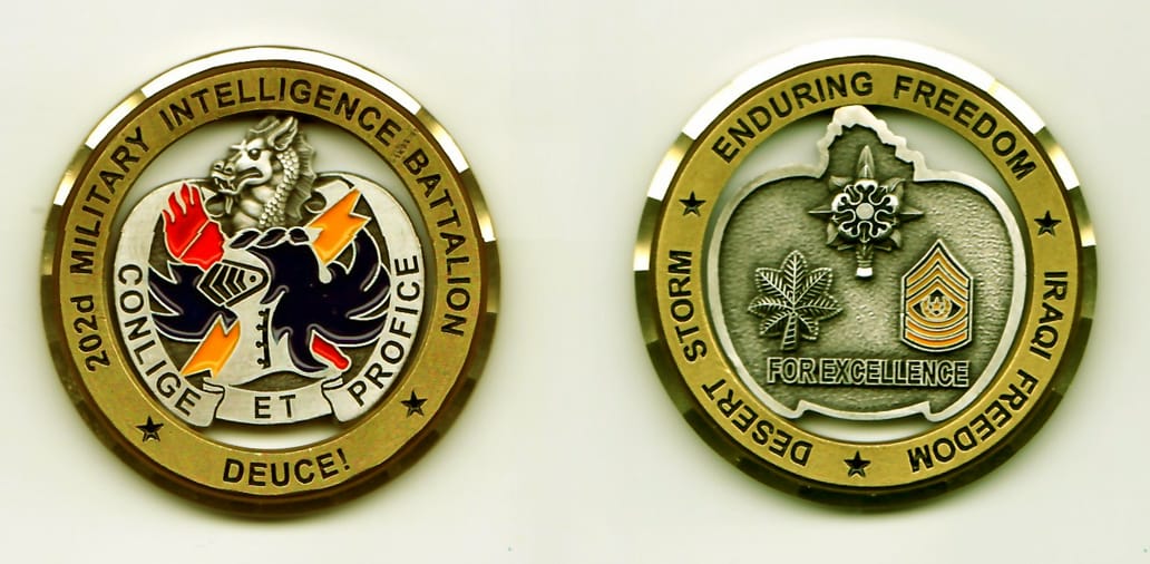 Round shaped, gold colored coin, 2 inches in diameter.