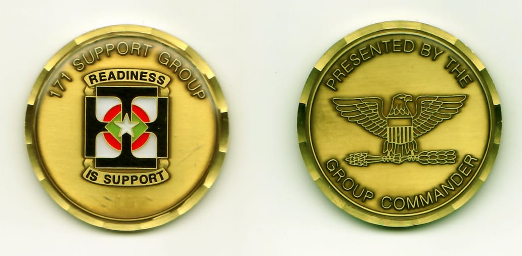 Round shaped, antique brass colored coin, 1-11/16 inches in diameter.