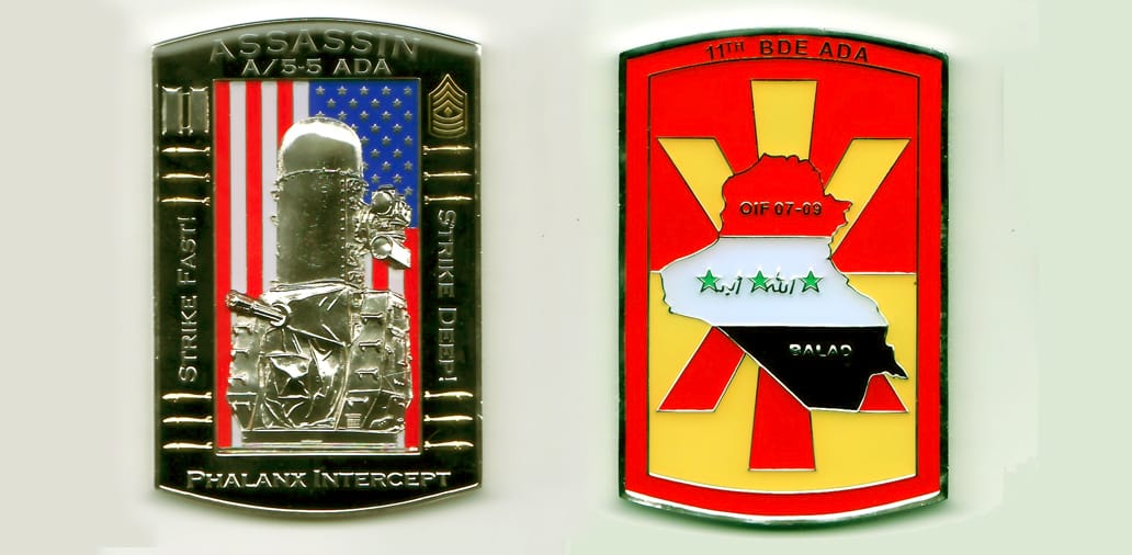 Retangular shaped, silver colored coin, with rounded top and bottom, 3 inches high x 2 inches wide.