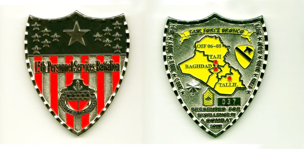 AG Shield shaped, silver colored coin,  2-1/4 inches high x 2 inches wide.