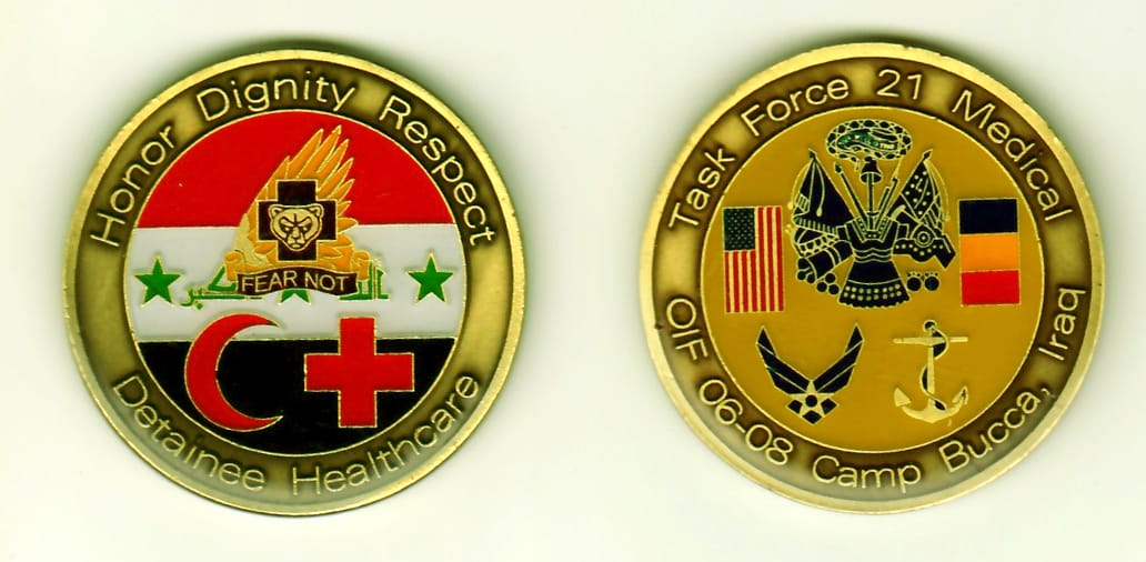 Round shaped, antique gold colored coin, 1-11/16 inches in diameter.