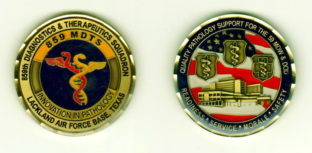 Round shaped, antique gold colored coin, 1-13/16 inches in diameter.