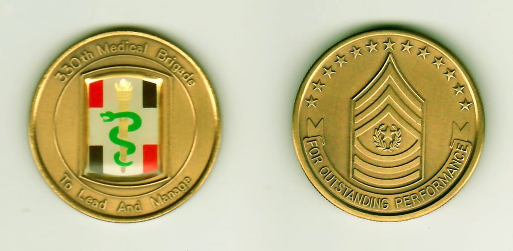 Round shaped, antique gold colored coin, 1-1/4 inches in diameter.