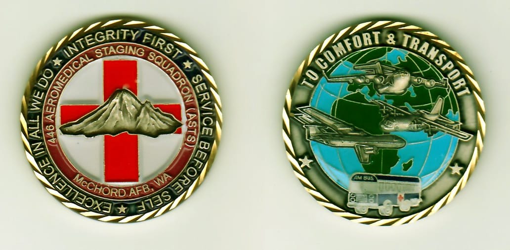 Round shaped, light gold colored coin, 1-1/4 inches in diameter.