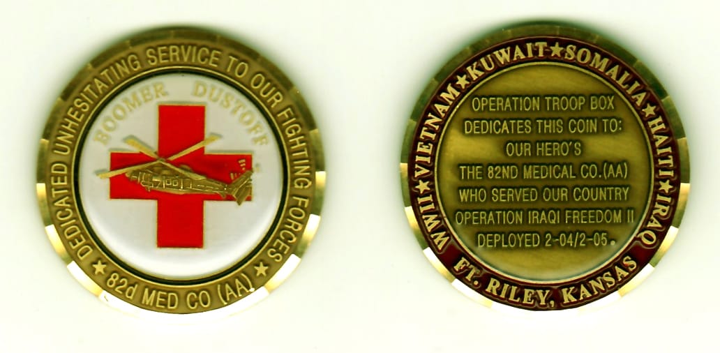 Round shaped, antique gold colored coin, 1-13/16 inches in diameter.