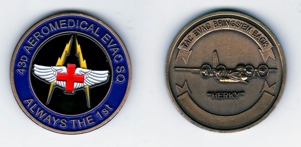 Round shaped, antique gold colored coin, 1-1/4 inches in diameter.