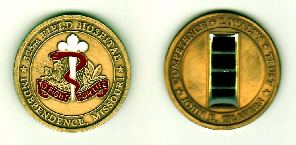 Round shaped, antique gold colored coin, 1-1/2 inches in diameter.