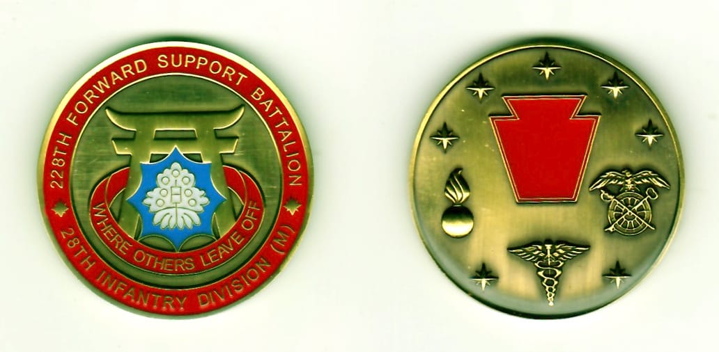 Round shaped, gold colored coin, 1-9/16 inches in diameter.