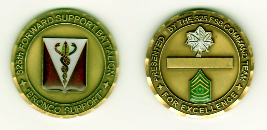 Round shaped, antique gold colored coin, 1-13/16 inches in diameter.