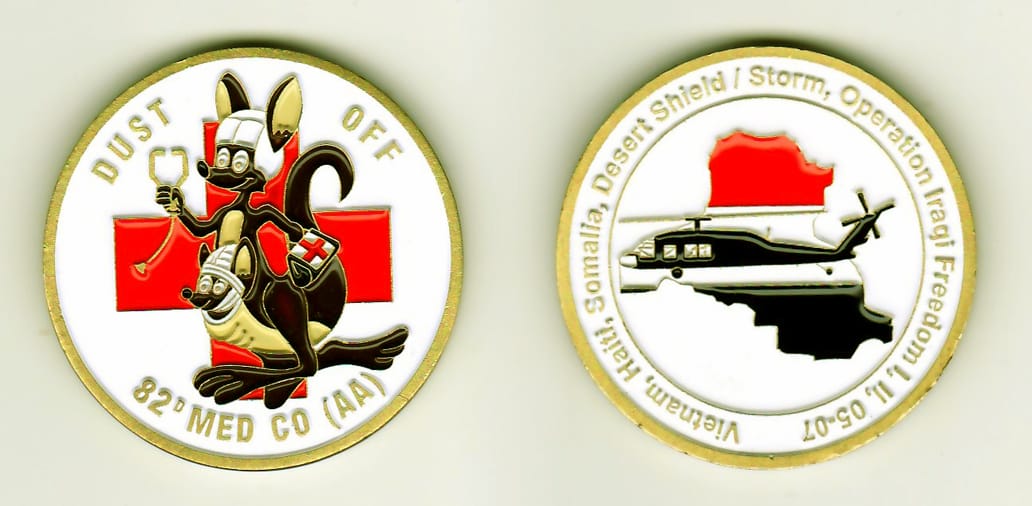 Round shaped, light gold colored coin, 1-13/16 inches in diameter.