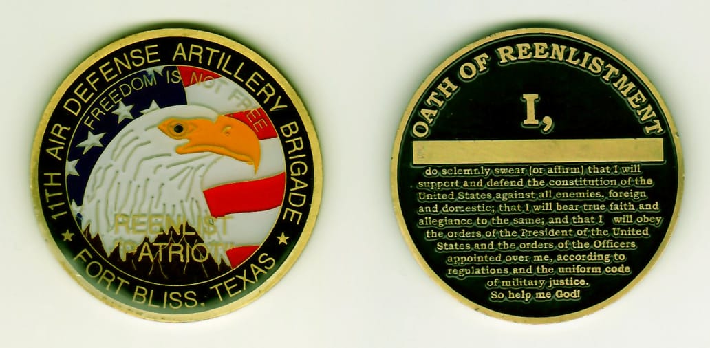 Round shaped, brass colored coin, 1-3/4 inches in diameter.