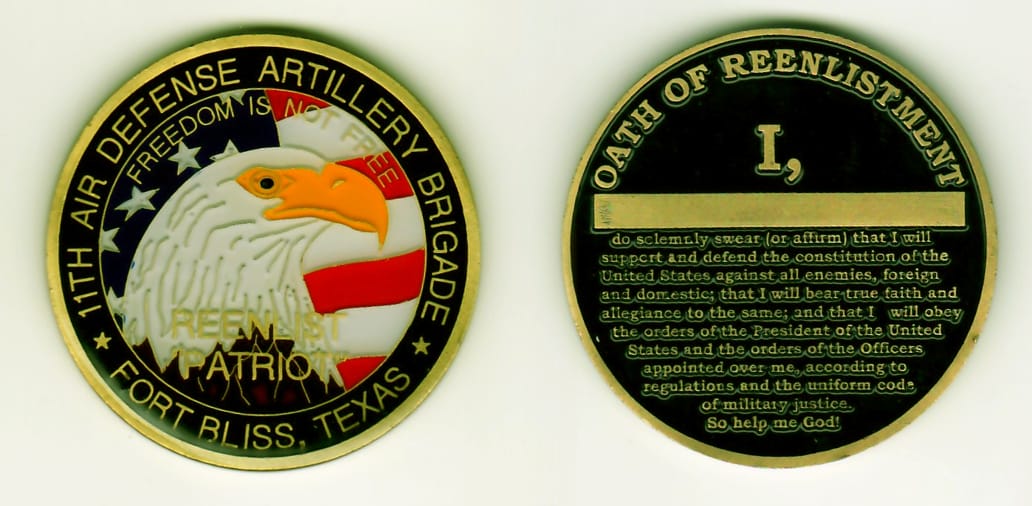 Round shaped, brass colored coin, 1-3/4 inches in diameter.