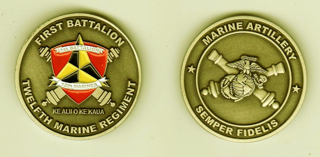 Round shaped, antique brass colored coin, 1- 1/4 inches in diameter.