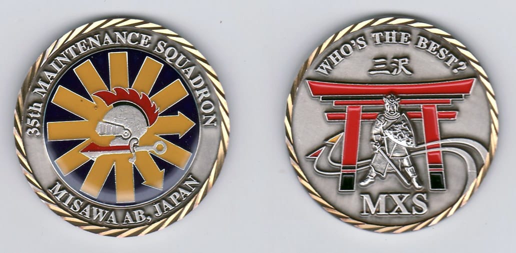 Round shaped, silver colored coin with gold rim, 1- 13/16 inches in diameter.