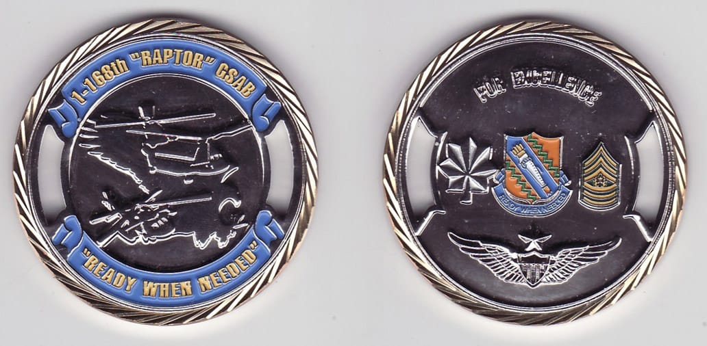 Round shaped, silver colored coin with gold rim, 1- 13/16 inches in diameter.