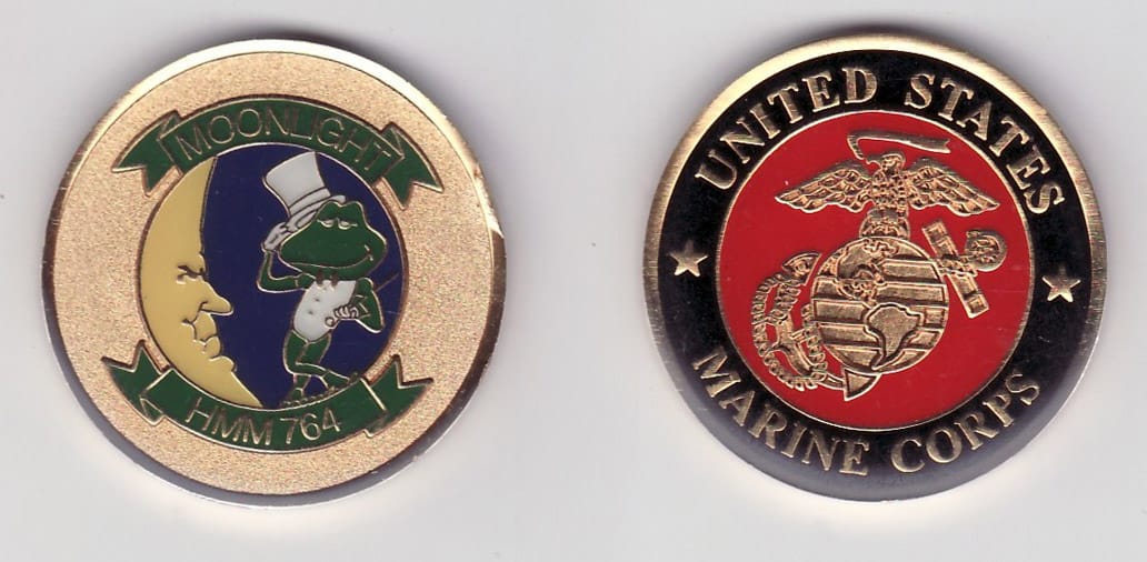 Round shaped, antique brass colored coin, 1- 1/4 inches in diameter.