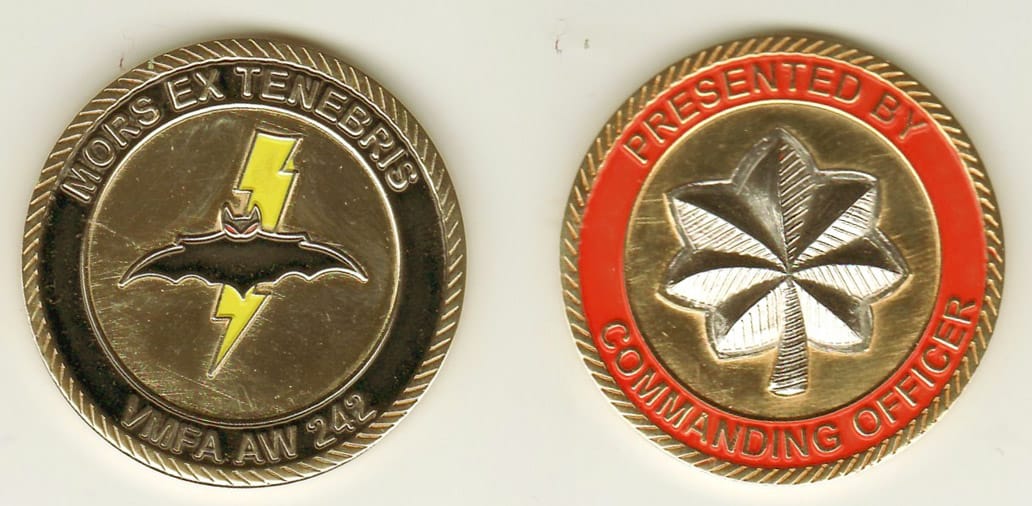 Round shaped, gold colored coin, 1- 13/16 inches in diameter.