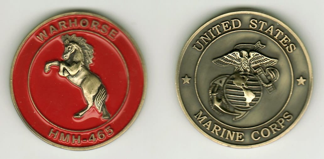 Round shaped, antique brass colored coin, 1- 1/4 inches in diameter.