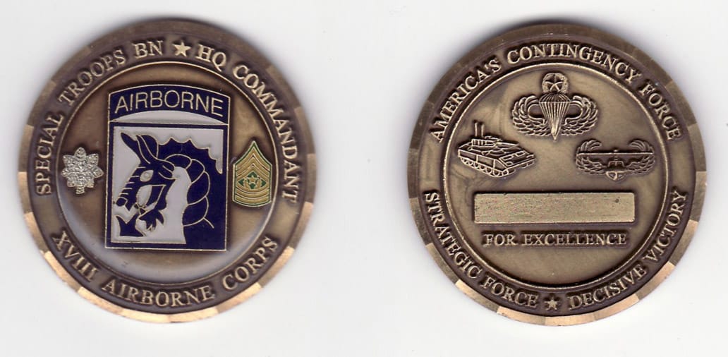 Round shaped, brass colored coin, 1- 13/16 inches in diameter.