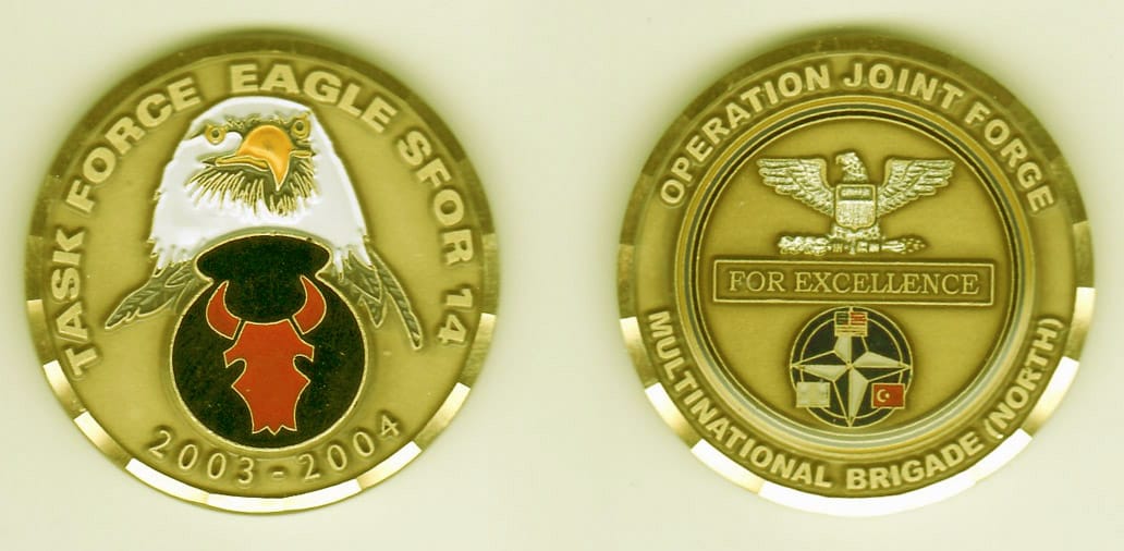 Round shaped, gold colored coin, 1- 13/16 inches in diameter.