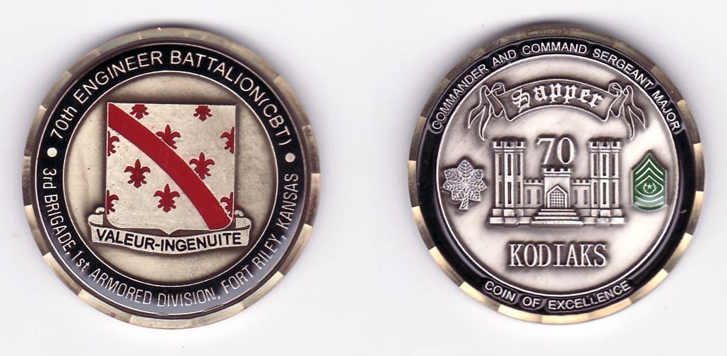 Round shaped, gold colored coin, 1- 13/16 inches in diameter.