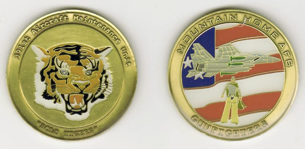 Round shaped, brass colored coin, 1-5/8 inches in diameter.