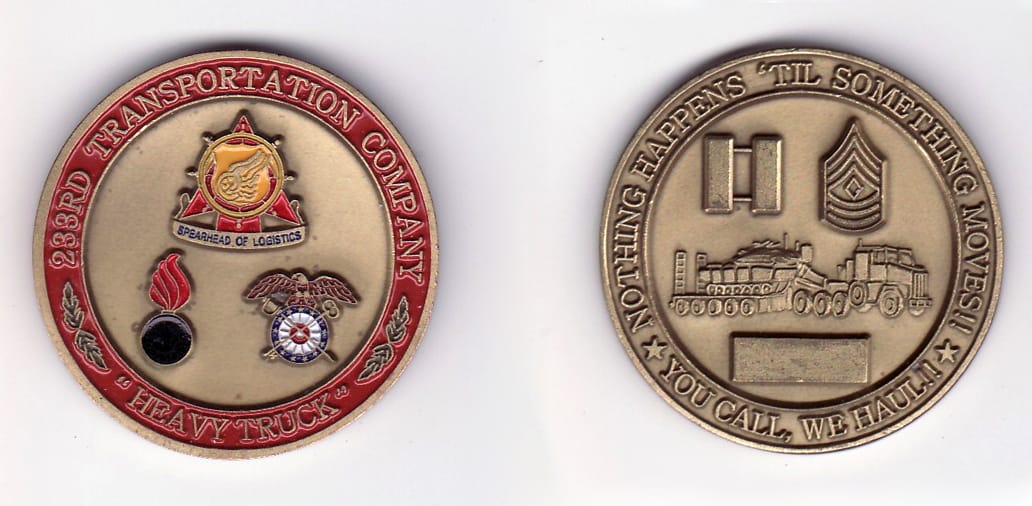 Round shaped, brass colored coin, 1- 13/16 inches in diameter.