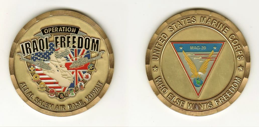 Round shaped, gold colored coin with brass colored rim, 2- 1/8 inches in diameter.