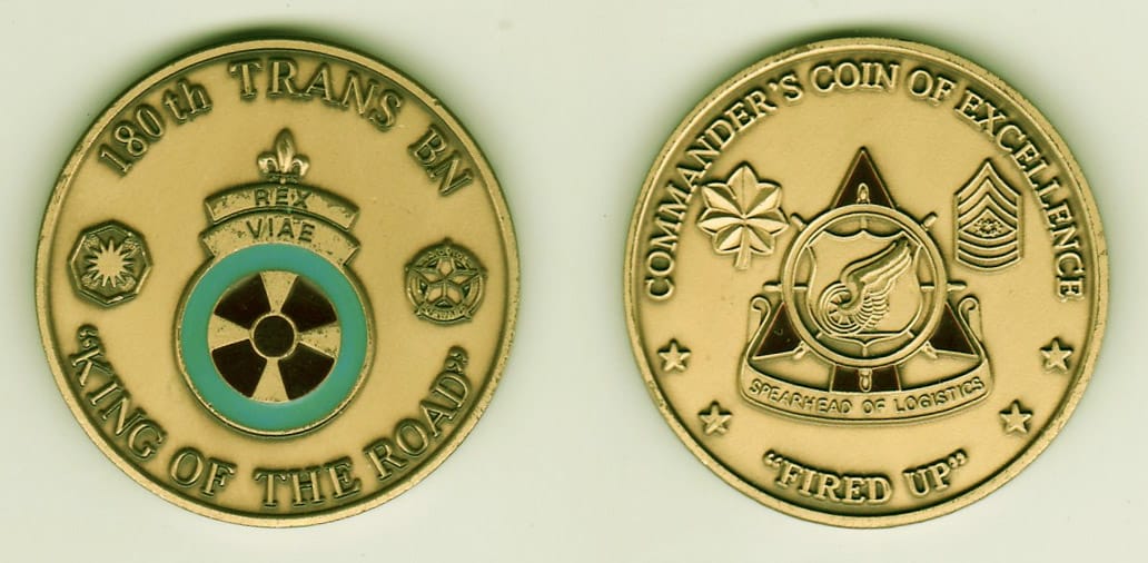 Round shaped, brass colored coin, 1- 13/16 inches in diameter.