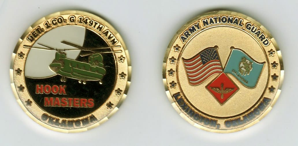 Round shaped, gold colored coin, 1-3/8 inches in diameter.